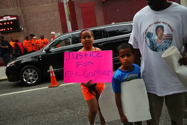 Protesters outside Eric Garner's funeral last month